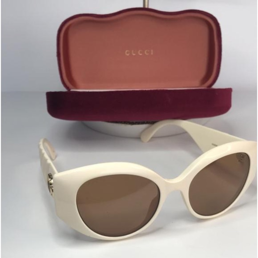 GUCCI GG0809S 002 cat eye sunglass comes in a ivory frame with brown lenses. - Picture 3 of 15